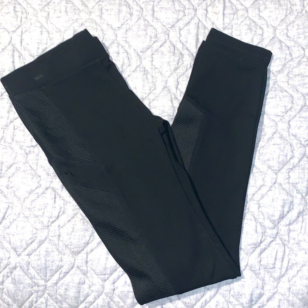 Bebe black leggings, elastic waist, ribbed sides. Small. Worn once perfect Care